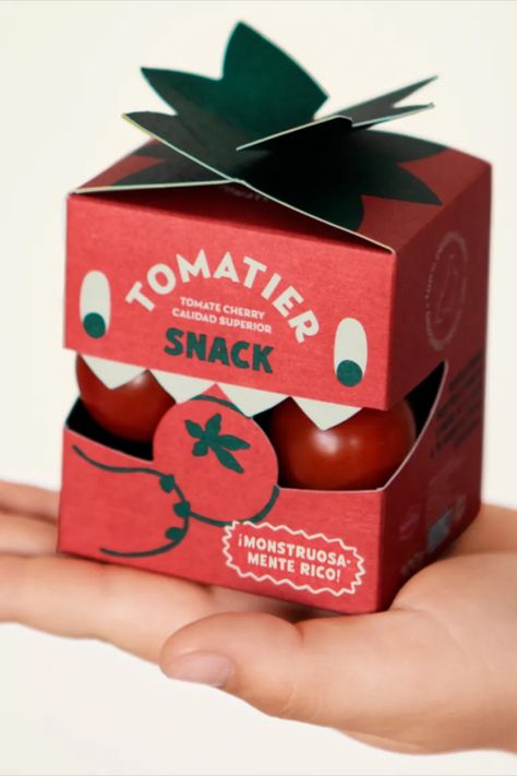 Meteorito hits a double whammy with their extremely cute design for Tomatier Snack’s cherry tomatoes: it looks like a little tomato with its smart red box and green, leafy tabs—and it looks like a little guy! Who doesn’t love a little guy? Apple Packaging Design, Packaging Box Design, Apple Picture, Monster Box, Visuell Identitet, Packaging Design Trends, Cool Packaging, Branding Design Packaging, Food Box