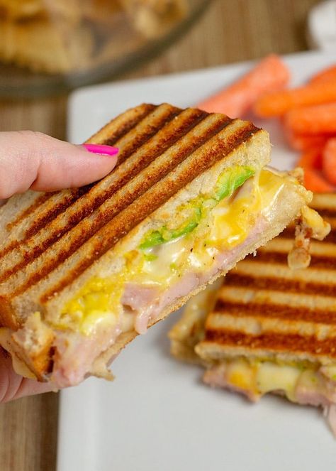 A Ham and Cheese Panini is crispy, cheesy and a delicious a way to use up your ham leftovers. Paninis are quick to make and everyone will love them! Ham Panini Recipes, Leftover Ham Ideas, Ham And Cheese Panini, Ham Panini, Recipes With Hawaiian Rolls, Sandwich Recipes Panini, Ham Sandwich Recipes, Ham Ideas, Ham Leftovers