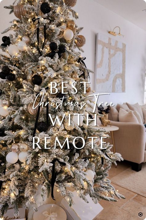 flocked Christmas tree on sale. it comes with a storage bag and remote with timer 😍 Follow me in the @LTK shopping app to shop this post and get my exclusive app-only-content! #liketkit #LTKHoliday #LTKSeasonal #LTKhome @shop.ltk Flocked Tree Inspiration, Black And White Flocked Christmas Tree Decor, Flocked Modern Christmas Tree, Christmas Tree Frosted Decorating Ideas, Flocked Black Christmas Tree, Flocked Christmas Tree Gold Ornaments, Gold And White Flocked Christmas Tree, Neutral Christmas Tree Flocked, Flocked Pine Christmas Tree Decorated