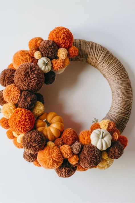 20 Pumpkin Wreath DIY [For Every Occassion] Pompom Diy Ideas, Autumn Pom Pom Wreath, Homemade Fall Wreath, Diy Door Wreaths, Autumn Wreath Ideas, Diy Pom Pom Wreath, Autumn Decorations Diy, Fall Wreaths Diy, Diy Autumn Decor