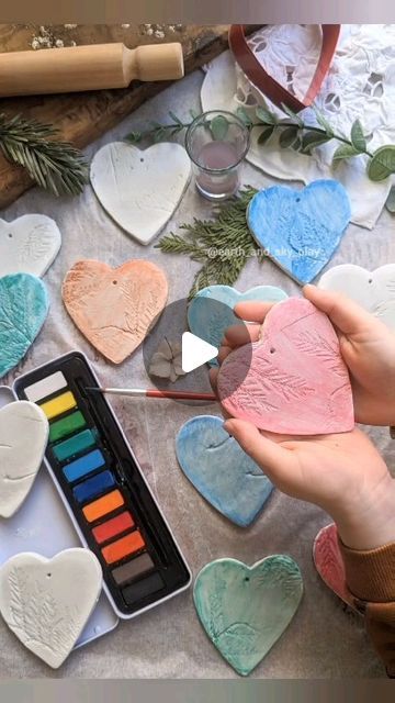 🌿Anna☀️| Crafts, Play & Learning on Instagram: "Nature Pressed Clay Hearts ♥️

The last in our heart series over the Valentine's period before we head into Spring!

Ad|A wonderful project we had the pleasure of working on for @theworksstores 🌿 We were challenged with providing a low cost crafting idea. 

We used about a third of our clay to make more than 20 hearts! We decorated them by using some of our dried leaf and flower stash to make impressions & then once dried we painted over then using our watercolour palette ♥️ I love how each one turned out.

You can try making your own air dry clay too! Ours never comes out very well 🙈 so this pack is handy to have in our crafting kit! 

Keep as ornaments, coasters, make a mobile or give away as a gift or use as gift tags! 

 #clayornaments Nature, Watercolour Palette, Anna Craft, Clay Hearts, Make A Mobile, Paper Embroidery, Watercolor Palette, Craft Day, Clay Ornaments