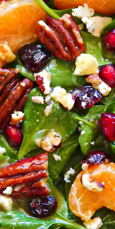 This simple 20-Minute Christmas Salad features classic holiday ingredients, such as pecans, mandarin oranges, pomegranate seeds, and dried cranberries. They are tossed with baby spinach, goat cheese, and homemade Honey-Mustard Lime Vinaigrette. This festive holiday salad will pair beautifully with your favorite Christmas main course and will be a great addition to your holiday menu. Christmas Tossed Salad Recipes, Cranberry Salad Dressing Vinaigrette, Honey Mustard Lime Vinaigrette, Red Hot Salad, Fruit Salad Side Dish, Christmas Pomegranate Salad, Holiday Chopped Salad, Best Salad For Christmas Dinner, Christmas Spinach Salad