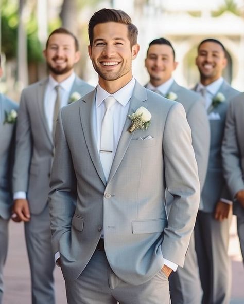 The grey groomsmen suit is a timeless and versatile choice, exuding elegance and sophistication. Its neutral color allows for effortless pairing with various styles and colors, ensuring a polished and refined look. Whether it's a traditional or modern wedding, the grey groomsmen suit is sure to make a stylish statement. Groom White Tie Grey Suit, Light Gray Groomsmen Suits Color Schemes, Light Grey Groomsmen Attire, Grey Suit Wedding Groom & Groomsmen Suits, Dusty Blue Wedding Menswear, Groomsmen Light Grey Suit, Groom And Groomsmen Attire Grey, Light Gray Suit Wedding, Gray Suits For Men Wedding