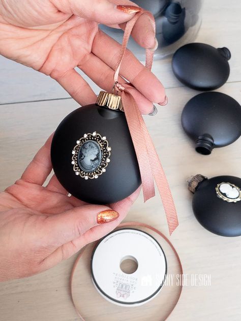 Diy Black Christmas Decorations, Bobbin Christmas Ornaments, Diy Black Ornaments Tree Decorations, How To Tie Ornament Ribbon, Elegant Christmas Ornaments To Make, How To Tie A Ribbon On An Ornament, Tying Ribbon On Ornaments, How To Tie Ribbon On Ornaments, Patriotic Christmas Ornaments Diy