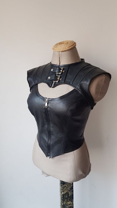 There are two separate pieces in the photo: bolero and strappy bustier.  Both can be sold together or separately. Any size avaliable I use premium quality sheepskin in these products I need measurements Please provide me when you place your order Cyberpunk Leather Outfit, Futuristic Steampunk Fashion, Unique Clothing Ideas, Japanese Fashion Design, Androgynous Fantasy Outfit, Bra Tops Outfit, Necromancer Aesthetic Outfit, Industrial Goth Fashion, Unique Fashion Pieces