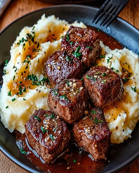 Garlic Butter Steak Bites and Mash - Easy Recipe Guide - optimal recipes Easy Steak Dinner For Two, Garlic Steak Bites Recipe, Garlic Steak Bites And Mashed Potatoes, Steak Tips And Mashed Potatoes, How To Cook Steak Tips, Recipes For Ribeye Steak, Best Steak Dinner Recipes, Easy Steak Recipes Dinners, Steak And Mashed Potatoes Recipe