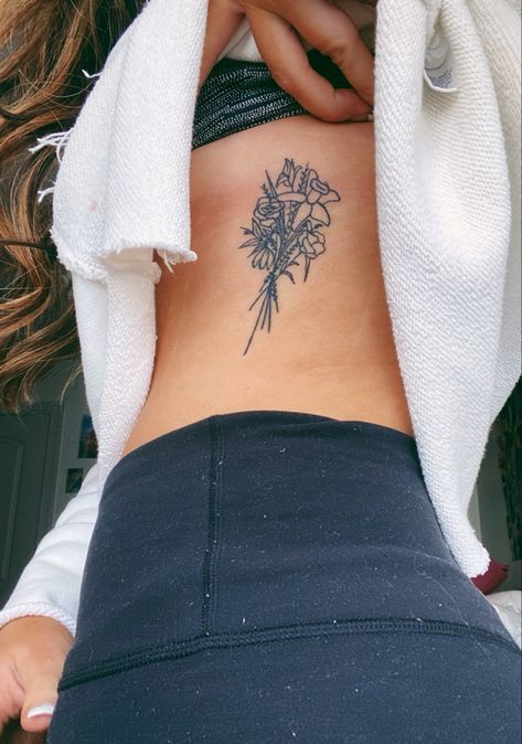 tattoo flowers dainty Bouquet Of Flowers Tattoo On Hip, Bouquet Hip Tattoo, Flower Bouquet Tattoo On Side, Birth Flower Bouquet Tattoo Ribs, Rib Flower Bouquet Tattoo, Bouquet Of Flowers Tattoo Ribs, Bouquet Tattoo On Ribs, Bouquet Rib Tattoo, Birth Flower Bouquet Tattoo Placement