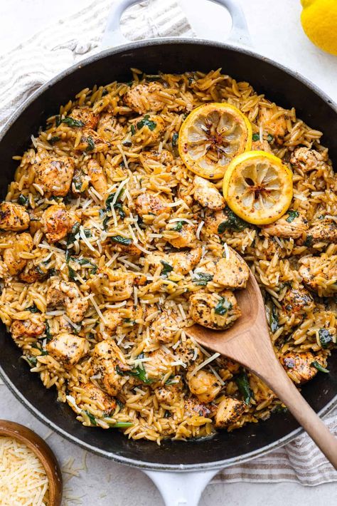 One-Pan Lemon Chicken Orzo is a comforting, well-rounded meal! Tender, juicy chicken pieces are joined with orzo pasta in a bright lemon sauce, resulting in melt-in-your-mouth deliciousness! Your whole family will adore this tasty dinner! One Pan Chicken Lemon Orzo, Greek Chicken And Lemon Rice One Pot, One Pot Lemon Chicken Orzo, Easy Light Dinners, Greek Lemon Chicken Orzo, Easy Orzo Recipes, Orzo Recipes Healthy, Lemon Orzo Pasta, Chicken Orzo Pasta