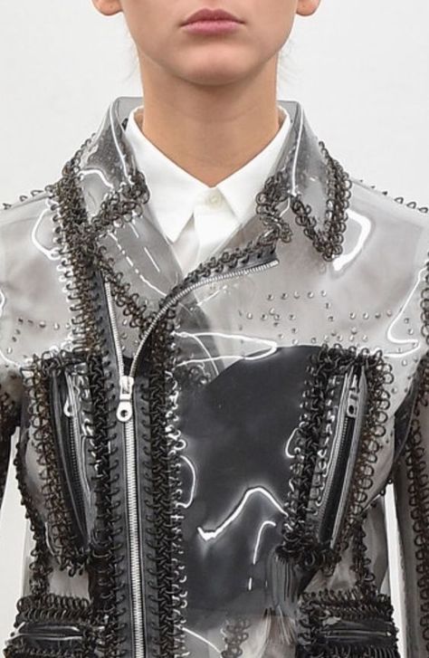 Grey transparent vinyl jacket with black macrame trim and front zippers creates quite the impression.. DIY the look yourself: http://mjtrends.com/pins.php?name=grey-clear-vinyl-for-jacket Noir Kei Ninomiya, Kei Ninomiya, Takashi Murakami, Transparent Fashion, Futuristic Fashion, A Jacket, Creation Couture, Textiles Fashion, Issey Miyake