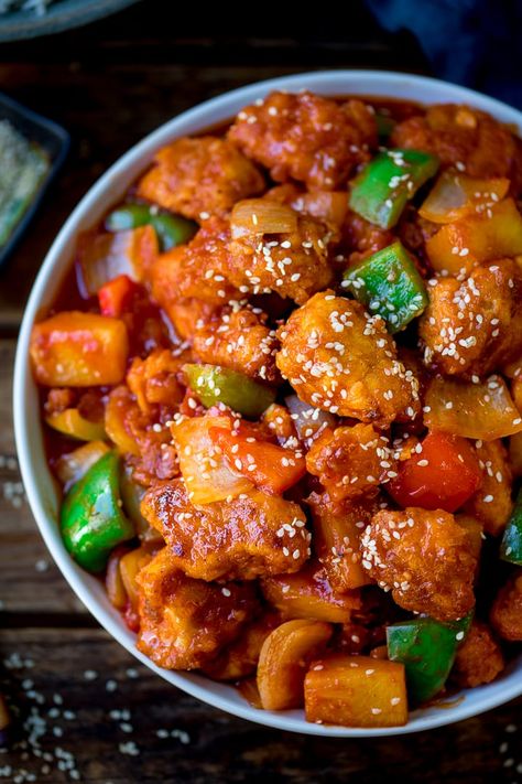 Homemade crispy sweet and sour chicken with a better-than-takeout sauce made from store cupboard ingredients! Ready in 25 minutes. #sweetandsour #sweetandsourchicken #chinese #chinesechicken #betterthantakeout #fakeaway #streetfood Store Cupboard, Lo Mein Recipes, Sweet And Sour Chicken, Sweet Sour Chicken, Sweet N Sour Chicken, Crispy Onions, Sweet And Sour Sauce, Amish Recipes, Interesting Food