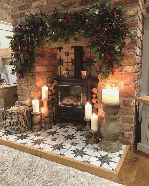 Living Room Logburner, Christmas Log Burner Fireplace, Log Burner Christmas Decorations, Tv On Wall Next To Fireplace, Decorative Logs In Fireplace, Fireplace Logs Decorative, Cozy Cottage Style Living Room, Brick Hearth Ideas, Red Brick Fireplace Living Room