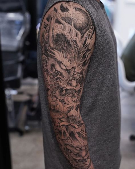 Fu Dog Sleeve Tattoo, Arm Sleeve Tattoos Dragon, Dragon Tattoo Men Arm Japanese Sleeve, Asian Dragon Tattoo Arm, Half Sleeve Tattoos For Men Upper Arm Japanese, Chinese Arm Sleeve Tattoo, Full Arm Dragon Tattoo Japanese Sleeve, Dragon Full Arm Tattoo, Dragon Arm Tattoo For Men