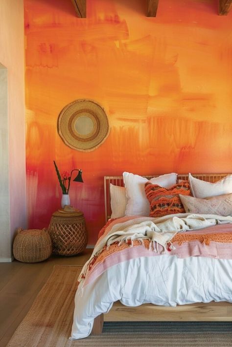 29 Chic Boho Bedroom Accent Wall Ideas to Transform Your Space Bohemian Wall Paint, Bohemian Wall Painting, Bedroom Orange Walls, Light Orange Walls, Boho Bedroom Accent Wall, Jungalow Bedroom, Orange Accent Wall, Sunset Interior, Chic Boho Bedroom