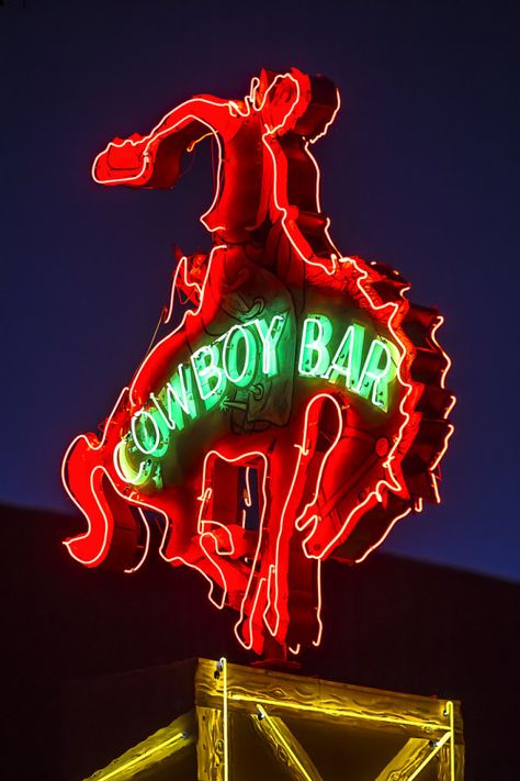 drinkmywhiskeyclear: “Million Dollar Cowboy Bar - Jackson Hole, WY ” Neon Cowboy, Cowboy Bar, Wyoming Landscape, Cowboys Bar, Old Neon Signs, Cool Neon Signs, Jackson Wyoming, Cowboy Aesthetic, Neon Moon