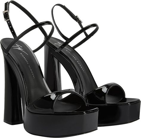 Elevate your style to new heights with the Giuseppe Zanotti Sylvy Platform. These statement-making heels seamlessly blend bold design with unmatched comfort. Step into fashion-forward luxury and make every stride a statement. #GiuseppeZanotti #SylvyPlatform #HighFashionHeels #StatementShoes #Heels Luxury Chunky Platform Sandals, Black Glossy Finish Open Toe Sandals, Luxury Open Heel Chunky Platform Heels, Luxury Chunky Platform Heels With Open Heel, Glossy Ankle Strap Sandals For Evening, Glossy Finish Ankle Strap Sandals For Evening, Luxury Open Toe Chunky Platform Heels, Luxury Open Toe Heels With Chunky Platform, Black Glossy Sandals For Evening