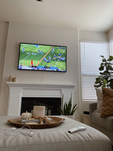 Watching the Chargers game in the living room, featuring neutral decor and the Frame TV. Football House Decor, Watching Football On Tv Aesthetic, Football Sunday Aesthetic, Watching Football Aesthetic, Fall Football Aesthetic, Football Season Aesthetic, Football On Tv, American Football Party, Playoff Party