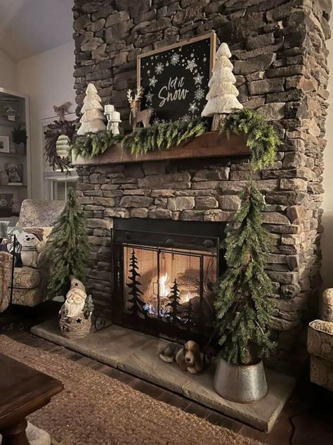 Tree By Fireplace Christmas, Farm Curb Appeal, Rustic Cabin Mantle Decor, Open Living Room And Kitchen And Dining, Winter Themed Home Decor, Christmas Mantel Decorating Ideas 2022, Rustic Fireplace Christmas Decor, Rustic Farmhouse Fireplace Stone, Decorating Fireplace Mantel For Christmas