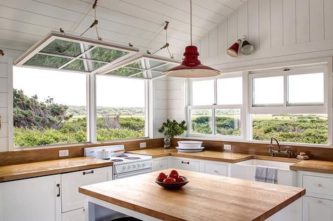 We can't get over the pulley-system windows in this Cape Cod beach cottage that look out on a protected salt marsh. Victoria Birch and Tei Carpenter, an interior designer and architect, respectively, and longtime friends, opened up the interior to bring in air and light. Take the full tour on Remodelista, or swipe up on our story | 📸 by @justine.hand Ocean Scape, Beach Cottage Kitchen, Cape Cod Beach House, Wood Counters, Cottage Details, Nautical Kitchen, Cape Cod Cottage, Kitchen Benchtops, Cape Cod Beaches