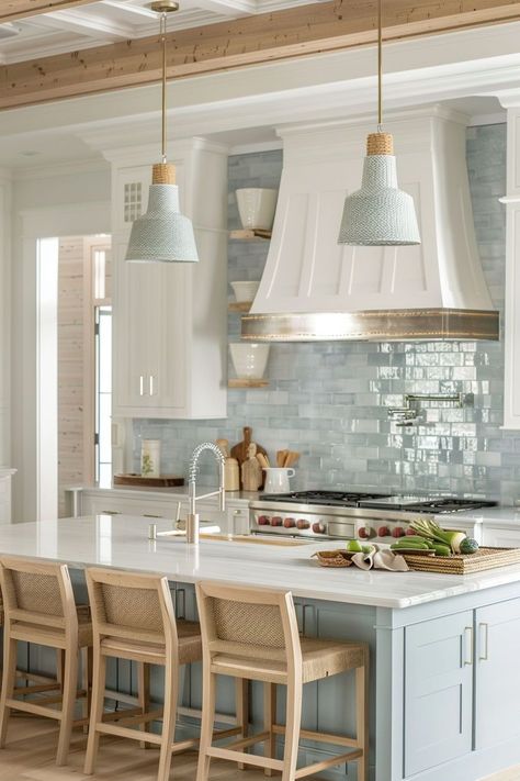 I am drawn to coastal kitchen design for its ability to infuse my home with a sense of laid-back luxury. The combination of light, breezy aesthetics and seaside-inspired elements creates a space that feels both stylish and welcoming, making everyday cooking and dining a delightful experience. New Home Trends Interior Design, Coastal Kitchen Aesthetic, Simple Coastal Kitchen, Blue Kitchen Islands With White Cabinets, Small Coastal Kitchens, Southern Coastal Kitchen, Coastal Modern Kitchen Beach Houses, Modern Beach House Kitchen Ideas, Coastal Granite Countertops