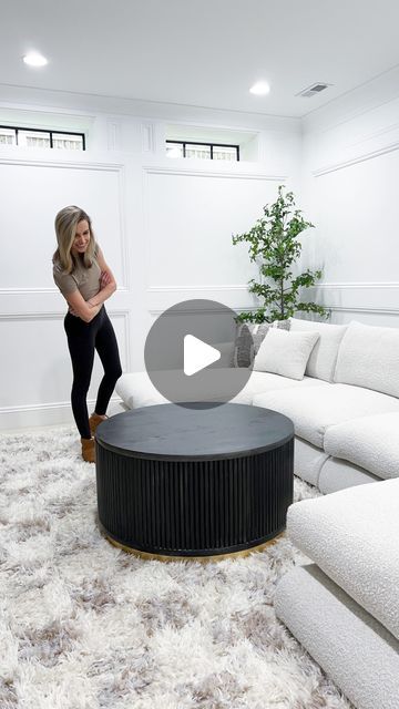 Lauren Jansen | DIY on Instagram: "DIY Storage Coffee Table! I found some similar coffee tables online that I loved… but I didn’t love the price points. So I decided to build one myself! I stacked 2 24” round edge glued panels on each other, nailed and glued them together. Then added a 36” round on top! Next, I cut down 28 6’ long, 3/4” wide dowel rods to 14”. I used hot wood glue to glue them on (making sure each was level). I used 140 total 14” dowel pieces 😳. I got wood glued them on the bottoms and sides and am shocked at how strong this glue is! I did end up flipping it upside down and adding nails through the bottom for extra stability. Next, I added a few supports inside the table and glued stoppers to the back of another 36” round. This will be my removable top! I caulked betwe How To Make An End Table, Pole Wrap Coffee Table, Fluted Coffee Table Diy, Diy Round Coffee Table With Storage, Convertable Furniture, Diy Storage Coffee Table, Diy Round Coffee Table, Round Coffee Table Diy, Coffee Table With Seating