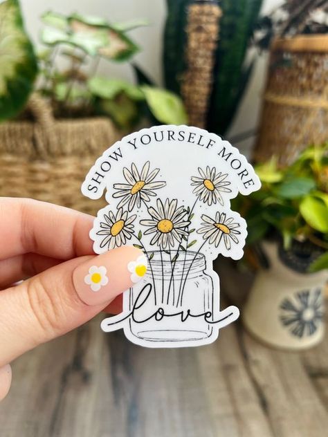 Show Yourself More Love Sticker, Self Care Sticker, Water Bottle Sticker, Daisy Sticker #stickersprintable #stickersheets #funnystickers #stickerideas #aestheticstickers #cutestickers Cute Aesthetic Stickers Handmade, Handmade Stickers For Journal, Hand Made Stickers, Sticker Ideas Printable, Aesthetic Diy Stickers, Home Made Stickers Diy, Water Bottle Sticker Design, Drawing For Stickers, Cricut Stickers Ideas