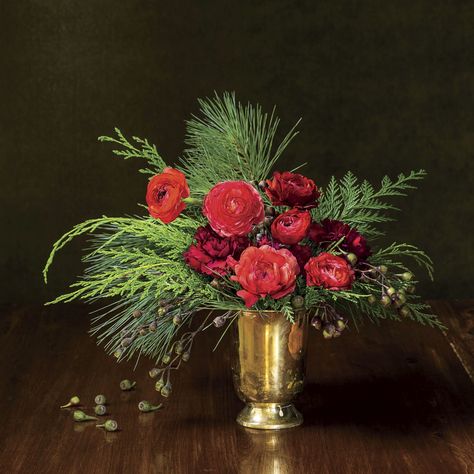 39 Christmas Centerpieces for Your Holiday Table | Southern Living Amaryllis Christmas, Holiday Flower Arrangements, Winter Floral Arrangements, Red Amaryllis, Christmas Bouquet, Festive Centerpieces, Christmas Flower Arrangements, Holiday Arrangement, Christmas Table Centerpieces