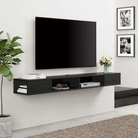 PRICES MAY VARY. 【LARGE STORAGE 】70" W x 11.8" D x 10.5" H .This floating tv console is perfect for DVD player, CDs, projector cable box, game console, TV component and decorations,side compartments provide additional storage. 【SPACE SAVING】Wall mounted console shelf,Keep the floor space under your television clear by storing TV equipment on the media console's wall mounted shelves.Cable Holes for hiding messy wires keeping your stuff neatly organized and within reach! 【Wire Management System】Th Black Floating Shelves Tv Wall, Tv Wall Mount Ideas Bedroom Small Spaces, Masculine Room Decor, Under Tv Shelf, Under Tv Decor, Entertainment Center Wall, Floating Shelves Tv Wall, Shelf Under Tv, Floating Shelf Under Tv