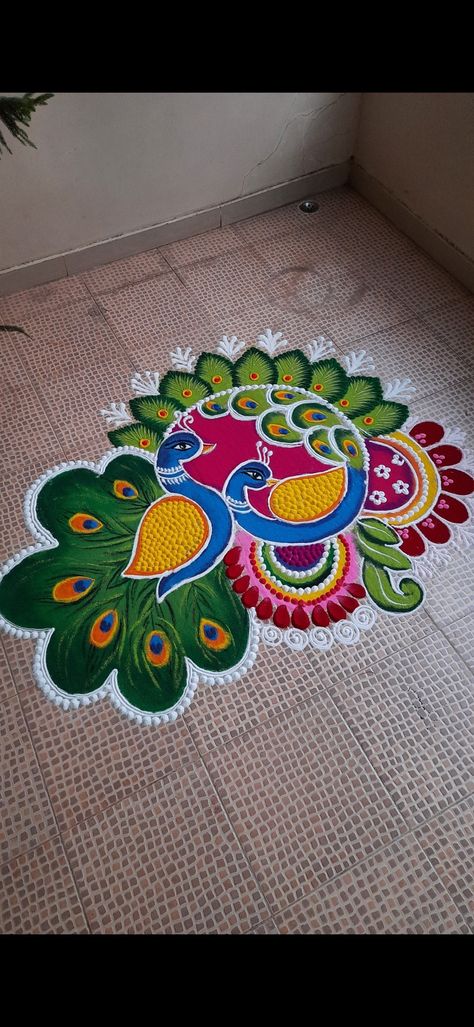 Rangoli Beautiful Designs, Ragoli Color Design Peacock, New Rangoli For Diwali, Unique Rangoli Designs Beautiful Peacock, Flower And Rangoli Design, Trending Rangoli Design For Diwali, Rangoli Designs For Diwali Peacock, Big Border Rangoli Designs, Ragoli Color Design 2024 New