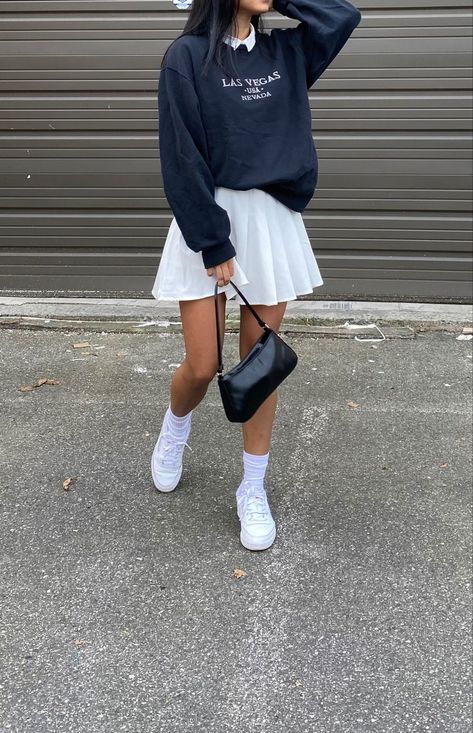 Skirt With A Sweater Outfit, White School Skirt Outfit, Skirts And Crewnecks, White Sneakers Skirt Outfit, Sweatshirts And Skirts Outfit, Sweater With Tennis Skirt, Baggy Jumper And Skirt, Skirt With Baggy Sweater, Sweater And Tennis Skirt Outfit