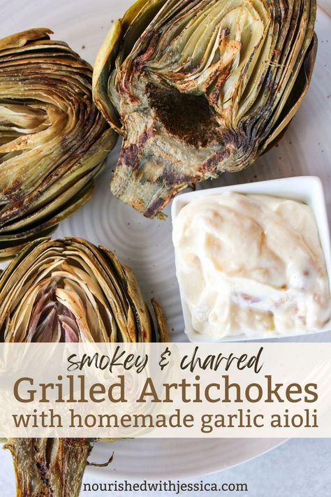 Elevate your summer BBQ with this Easy Grilled Artichokes with Homemade Garlic Aioli recipe. Charred to perfection and paired with a creamy garlic aioli, these artichokes make a fantastic appetizer or side dish. With simple ingredients and straightforward instructions, you can enjoy this fresh artichoke recipe that's both delicious and easy to prepare. Impress your guests with this delightful summer treat that combines smokey flavors and a rich dipping sauce. Grilled Artichoke Recipes, Fresh Artichoke, Artichoke Recipe, Garlic Aioli Recipe, Grilled Artichoke, Aioli Sauce, Aioli Recipe, Artichoke Recipes, Garlic Aioli