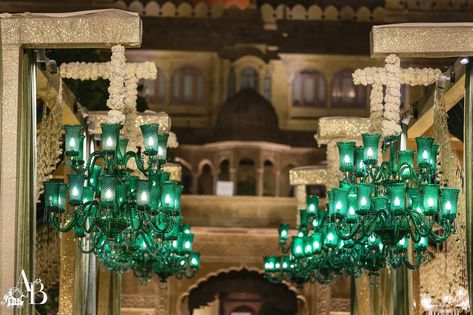 A dazzling green chandelier overhead exudes a calming Sufi charm, while low-seating lounges invite guests to unwind and reminisce about the olden days. The fragrance of beautiful blooms fills the air, blending perfectly with the soothing Sufi music that dances through the space. “Nights Of Noor” For Ishaan and Ashni Design & Decor : @abhinavbhagatevents Venue : @suryagarh Planning : @touchwoodgroup Catering : @foodinc.yumyumtree Photography & Videography : @atozo.in @tapishkashyapphotos Re... Sufi Night Decor, Sufi Night, Qawali Night, Oak Decor, Sufi Music, Green Chandelier, Low Seating, Green Chandeliers, Olden Days