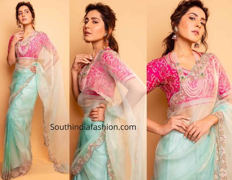 Raashi Khanna attended the audio launch event of Sanga Thamizhan movie wearing a pastel blue organza saree that featured scalloped embroidered borders paired with contrast pink embroidered blouse by Label Nimbus. Sky Blue Saree With Pink Blouse, Pastel Blue Saree Contrast Blouse, Pastel Blue Organza Saree, Sky Blue Saree Contrast Blouse Colour, Light Blue Saree Contrast Blouse, Blue Saree With Pink Blouse, Sky Blue Saree Contrast Blouse, Contrast Saree Blouse Ideas, Pink Saree With Contrast Blouse