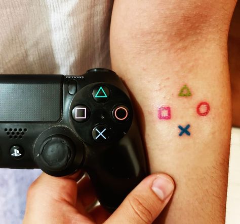 My first tattoo, little and colorfull inspired in PS buttons and the love i feel for videogames. #playstation #gamer #tattoo #pstattoo #smalltattoo #playstationbuttons #psbuttons #ps4 #girl #gamergirl Matching Nintendo Tattoos, Geeky Tattoo Ideas, Playstation Tattoo Ideas, Ps4 Tattoo, Geeky Tattoos, Playstation Tattoo, Rex Tattoo, Xbox Design, T Rex Tattoo