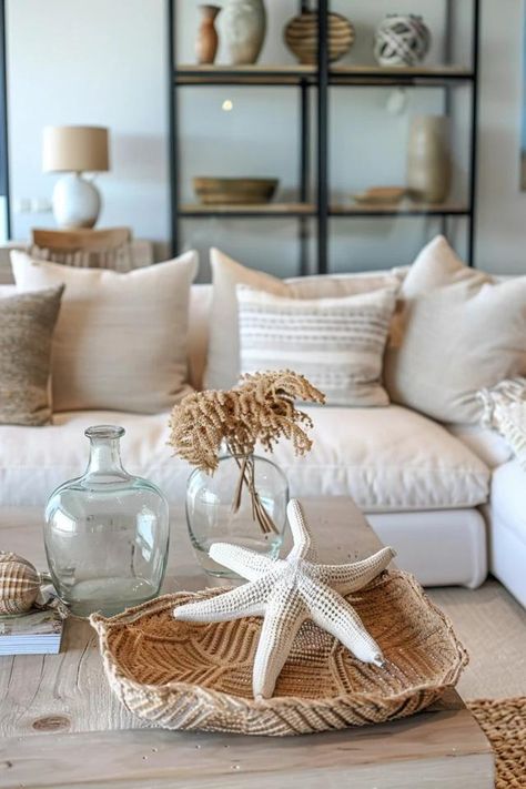 Cozy Coastal Living Room Ideas for Your Home Grey Couch Beach Living Room, Boho Beach Living Room Ideas, Ikea Coastal Living Room, Beach Coastal Aesthetic, Boho Beach House Living Room, Coastal Vibes Decor, Seaside Living Room, Dark Coastal Decor, Coastal Condo Decorating Ideas