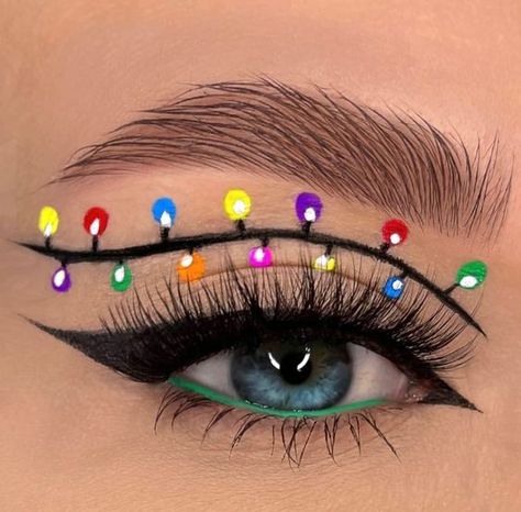 New Years Eyeliner Looks, Christmas Tree Eye Makeup, Christmas Light Eyeliner, Christmas Lights Makeup Looks, Christmas Light Makeup, Christmas Graphic Eyeliner, Christmas Eye Looks, Creative Christmas Makeup Ideas, Christmas Eye Shadow