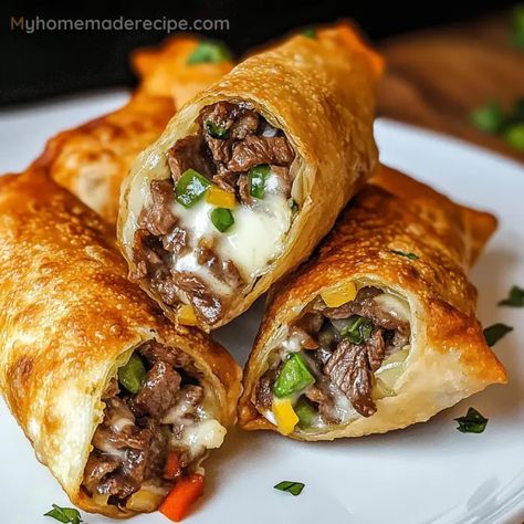 Crispy Philly Cheesesteak Egg Rolls Recipe - My Home Made Recipe Philly Cheese Steak Egg Roll Recipes, Philly Cheese Steak Rolls Recipe, Philly Steak And Cheese Egg Rolls, Philly Cheesesteak Roll Ups, Philly Cheese Steak Egg Rolls Ground Beef, Philly Cheesesteak Burrito, Steak Cheese Egg Rolls, Air Fryer Philly Cheesesteak Egg Rolls, Cheesesteak Egg Rolls Recipe