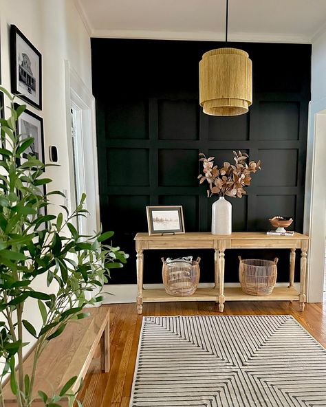 Black, White & Wood 🖤 It was so fun renovating this house (it was a big renovation! It’s a historic home and took us a year to complete!) and designing was extra fun - it was so different than what we had done in the past. Here we did a black, white, and wood tones throughout with a modern organic, neutral yet bold style! I loved this so much after we finished this home that I started incorporating bold pops at my primary home! This is our second home that we visit often. It’s close to m... Black And White Decor With Wood Accents, Black White And Wood Color Scheme, Black Hallway, House Redo, Black Kitchen Island, Wood Room, Second Home, Modern Organic, Wood Tones