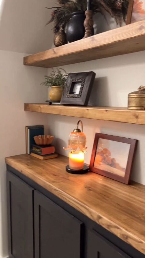 We built these easy DIY floating shelves in place even though our alcove was a very tight space. We’ll take you through the steps for how to build floating shelves. Stain Color For Floating Shelves, Decorating Long Floating Shelves, How To Make Kitchen Shelves, How To Make Thick Floating Shelves, Floating Shelves Stain Color, 2x4 Floating Shelves, Diy Shelves On Side Of Fireplace, Pantry Floating Shelves Diy, Fireplace Ideas With Floating Shelves