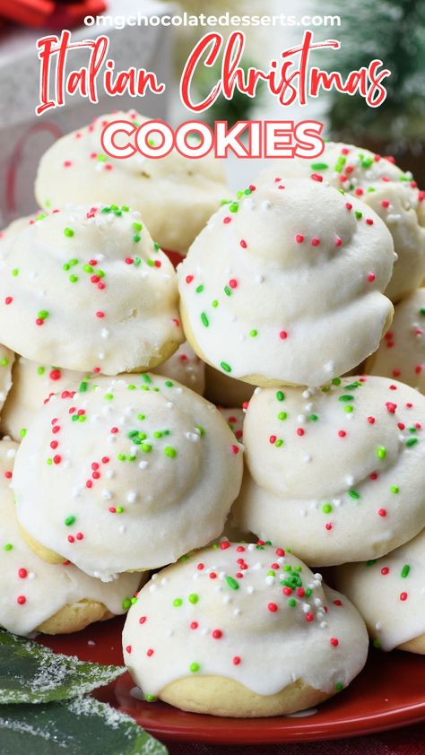 Celebrate the holidays with these classic Italian Christmas cookies! Soft, buttery, and topped with a festive white icing and colorful sprinkles, these cookies are perfect for any holiday gathering. Easy to make and even easier to enjoy! #ItalianCookies #ChristmasDesserts #HolidayBaking #FestiveTreats via @https://www.pinterest.com/omgchocodessets/ Italian Tutu Cookies, Baking Soda Vs Baking Powder In Cookies, Italian Fudge Roll, Anginetti Cookies Italian Recipe, Swedish Heirloom Cookies, Betty Crocker Christmas Cookie Recipes, Pressed Christmas Cookies, Easy Large Batch Christmas Cookies, Cookies For The Holidays