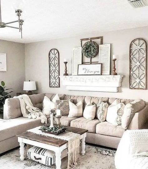 a chic neutral farmhouse living room with a tan sectional, a shelf with shutters and wooden candlesticks, a low coffee table Cozy Farmhouse Living Room, Modern Farmhouse Living Room Decor, Living Room Wall Decor Ideas, �Серая Кухня, Room Wall Decor Ideas, Farmhouse Living Room Decor Ideas, Rustic Farmhouse Living Room, Modern Farmhouse Living, Living Room Sofa Design