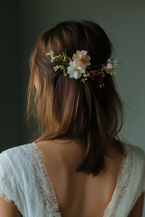 These 98 boho bridal hairstyles with flowers are ideal for a nature-loving bride. From soft waves adorned with delicate blooms to intricate braids with floral accents, these styles are simply stunning. Discover your perfect boho look! #BohoWeddingHair #FlowerHair #NatureInspired Bridal Floral Hair, Flower Halo Wedding Hair, Simple Wedding Flower Crown, Short Wedding Hair Flowers, Fall Flower Crown Wedding Floral Headpiece, Bridesmaid Flower Hair, Flower In Hair Wedding, Wedding Hair Wildflowers, Bride Hairstyles Flowers