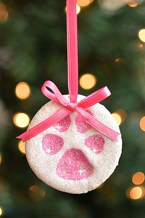 Paw Print Salt Dough Ornaments  - CountryLiving.com Christmas Ornaments Homemade Rustic, Christmas Diy Kids, Paw Ornament, Paw Print Ornament, Salt Dough Ornaments, Dough Ornaments, Dog Christmas Ornaments, Easy Christmas Crafts, Christmas Keepsakes