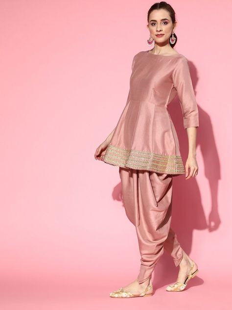 Buy pleasing dirty pink panelled kurta with dhoti pants and organza dupatta for women which is crafted from silk blend fabric. This beautiful style kurta set goes perfectly for upcoming festive season and grand events. Dhoti Kurta Sets For Women, Frock And Dhoti Salwar, Peplum With Dhoti Pants, Suit Dhoti Design, Kurta Set With Organza Dupatta, Indian Kurta Styles For Women, Dhoti Anarkali Dress, Pakistani Dhoti Suits, Pink Dhoti Outfit