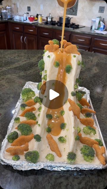 Daniella Shaba on Instagram: "Welcome to Jurassic park 🦕  Okay but this Dino nugget mashed potato hill was so fun to make , even though it took me 3 hours to get the shape right , it turned out so cute! ☺️" Mashed Potato Mountain With Dino Nuggets, Dino Nugget Mashed Potato Volcano, Dinosaur Volcano Mashed Potatoes, Dino Ranch Cake, Jurassic Park Dinner And A Movie, Welcome To Jurassic Park, Jurassic Park 3rd Birthday Party Amazon.com, Jurassic Park Birthday, 2024 Art