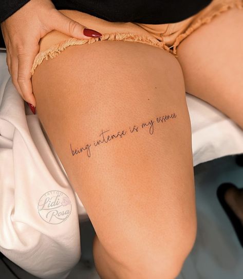 Horizontal Above Knee Tattoo, Quote Tattoos For Women Thigh, Front Thigh Quote Tattoo Women, Thigh Word Tattoo Women, Quad Tattoo Women, Behind Leg Tattoo Thighs, Cute Small Tattoos For Women, Small Thigh Tattoos, Thigh Tattoo Quotes