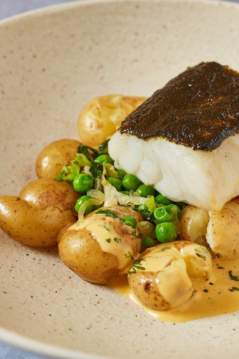 Richard Bainbridge serves up a stunning baked Norwegian cod recipe, topped with seaweed butter before cooking for a pleasantly salty, umami finish. A simple lettuce and pea fricassee and new potatoes make great accompaniments, along with an unusual mint Hollandaise that he makes with rapeseed oil, instead of the customary clarified butter. Cod Fillet Recipes, Lettuce Recipes, Baked Cod Recipes, Fried Cod, Cod Recipe, Great British Chefs, New Potatoes, Cod Recipes, Cooking Spray