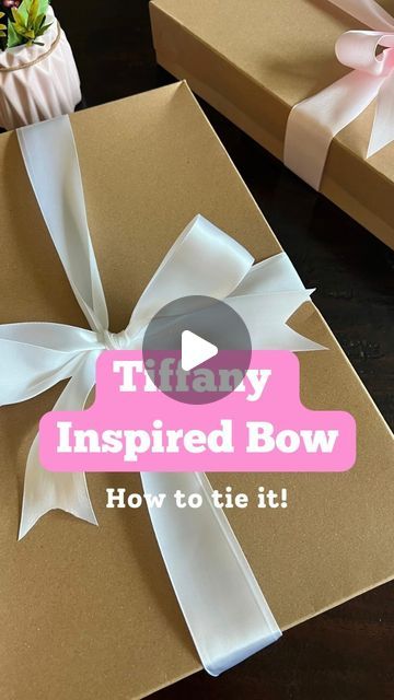 The Shortcut Girl • Tips & Tricks for Home + General Life on Instagram: "This bow is T.I.P Timeless. Iconic. Perfect  #wrapping gifts #giftwrappinghacks #bowsbowsbows #giftwrapping #giftboxideas #wrappinghacks #giftwrappingideas #giftwrapped #presentwrapping #bowtutorial #bowmaking #giftwrap" Diy Tulle Bow Gift Wrapping, Tying A Gift Bow, Bow For Box Gift, Tie Bow On Present, How To Put Ribbon On A Gift, Box Bow Wrapping, How To Tie A Bow On A Package, Wrapping A Bow On A Present, Package Bows Diy Simple