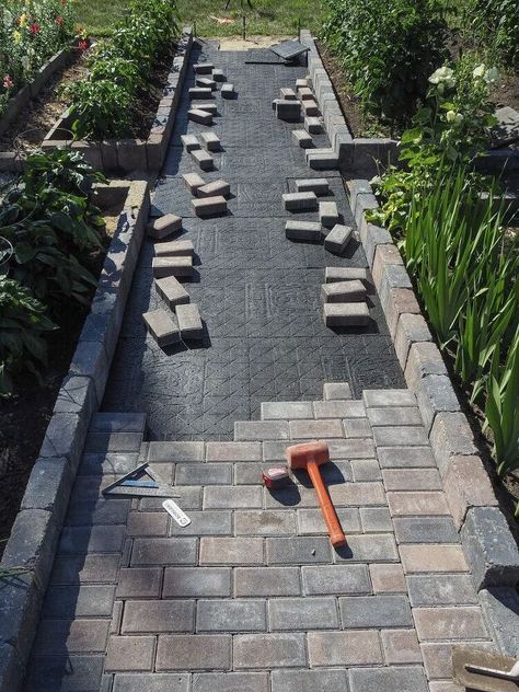 The Brick Paver Sidewalk Ideas, Walking Path Next To Driveway, Paver Base Panels, Paver Designs Walkways, Diy Paved Driveway, How To Pave Driveway, How To Make Pavers, Pavers Next To Driveway, Paver Seating Area