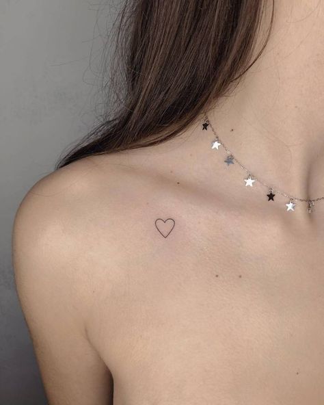 Tiny Heart Tattoo On Collar Bone, Minimalistic Collarbone Tattoo, Cute Clavicle Tattoos For Women, Collar Bone Heart Tattoos For Women, Small Heart Tattoo Collar Bone, Collar Bone Women Tattoo Ideas, Heart On Collarbone Tattoo, Heart On Collarbone, Fine Line Tattoo On Collarbone