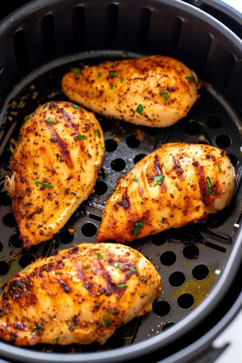 These easy air fryer chicken breasts are perfect for busy nights! In 25 minutes or less, you'll have perfect, tender and juicy chicken. Air Fryer Boneless Skinless Chicken Breast, How To Cook Chicken In Air Fryer, Air Fryer Boneless Skinless Chicken Breast Recipes Easy, Juicy Air Fryer Chicken Breast, Air Fryer Grilled Chicken Breast, Chicken Breasts In Air Fryer, Air Fryer Chicken Breast Boneless, Ninja Air Fryer Recipes Easy, Airfryer Chicken Breast